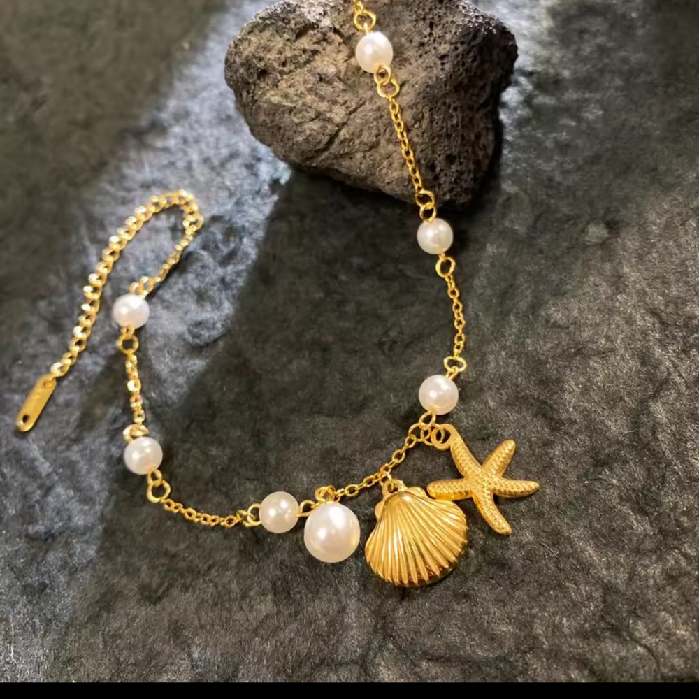 Gold and Pearl Seashell Charm Bracelet
